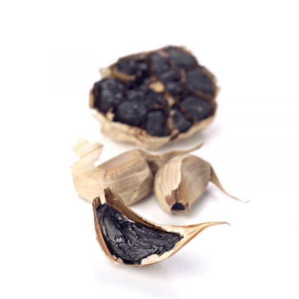 How is black garlic produced?